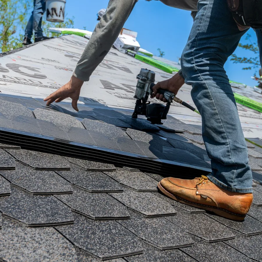 Midland Roofers installer at work